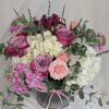 Collection of Hydrangea, Spray Roses, lavender,  in an old fashioned rustic