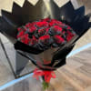 25 Red Roses wrapped &amp; painted with black paint, giving it a