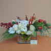 An arrangement that combines the warmth and the chill of winter comes