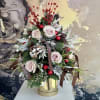 Brighten any space with our Elegant Holiday Flower Arrangement! Bursting with vibrant