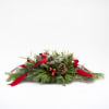 Designed to last the whole season.This festive centerpiece captures the warmth and
