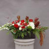 A festive fresh holiday arrangement that will bring joy to the world