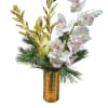 Graceful white cymbidium orchids shine against golden-leaf accents, lush winter greenery, and