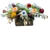 All Eyes on Me is a striking floral display featuring white anemones