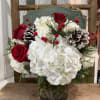 A magical combination of hydrangeas, roses, berries and pine cones.

Delivery minimum is