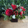 Gerbera Daisy, roses,tulps,  hyperiucm, wax, pine cones and mini carnation with