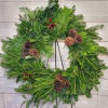 These elegant 28&rdquo; fresh evergreen wreaths are produced with a mix of