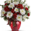 Spread the joy of the season with this merry bouquet of red