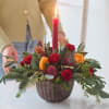  A gorgeous selected of fresh festive flowers, arranged by a florist