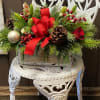 Sensational Christmas greens with beautiful flowers from the season. 