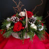 Classic Christmas basket with holiday greens, pine cones and red and white