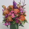 Rose, Mokara Orchid, Liatris, Spray Rose, Hypericum, Seeded Eucalyptus
