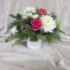 Add a pop of holiday cheer with this festive Christmas arrangement. Pink