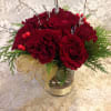 This petite arrangement is just the perfect touch.  Designed in a