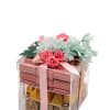 A charming acrylic gift box filled with premium assorted chocolates and topped