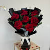 This beautiful bouquet features premium red roses paired with fresh greenery, wrapped