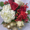 Classic Christmas bouquet of Roses, berries, Pinecones,  Cedar, Hydrangea mix that