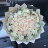 White roses with a rime of mix flowers