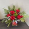 Deck the halls with timeless holiday style! This joyful bouquet of Christmas