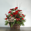 Get in the holiday spirit with this festive centerpiece! This arrangement includes