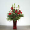Get in the holiday spirit with this festive centerpiece! This tall and