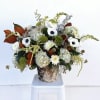 Introducing our new winter flower arrangement, featuring fluffy hydrangeas, lush magnolia leaves