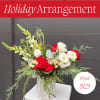 A festive Holiday Arrangement is a cheerful and elegant display inspired by