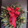 This stunning festive wreath is what your front door needs. 