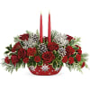 Make your holiday table shine with this festive candlelit centerpiece that is