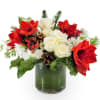 Our traditional holiday designer&#039;s choice arrangement featuring red and white seasonal blooms