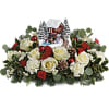 A beautiful collectable by Thomas Kinkade filled with assorted Christmas greens, flowers