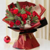 This charming bouquet features a beautiful combination of red roses and red