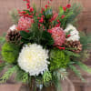 Where tradition meets a little tropical. Classic long lasting blooms accented with