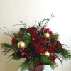 Traditional Christmas elegance designed in a red tartan vessel that evokes winter