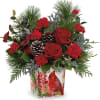 Paint a magical holiday scene with this classic Christmas bouquet, arranged in