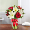 Fresh-picked red &amp; white blooms are hand-arranged in a glass vase. 

Please