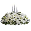 All white lilies roses and candles 