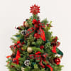 A striking seasonal arrangement designed in a wooden box, featuring fresh evergreen