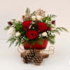 Celebrate the season with timeless elegance. This classic sleigh arrangement features lush