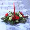 Light up your holidays with a single candle centerpiece created by Lucille