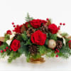 Elevate your holiday table with this sophisticated centerpiece, artfully arranged in a