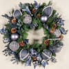A holiday wreath in a cool shade of denim blue. 