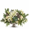 Fresh winter greens and snow-white blooms are paired to perfection in this