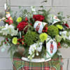 Enjoy This Nutcracker Inspired Christmas Arrangement with a Mixture of 
Red, Green