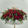 Beautiful Christmas Vase with red roses, topped with a lovely crown. 