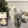 The Frasier Fir gift set comes with a beautiful pine-scented candle, diffuser