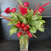 Our Half dozen red roses with Christmas greens