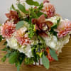 Combinations of spring flowers ( dahlia, orchids cymbidium , white hydrangeas )