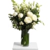 A chic all-white arrangement designed with a modern touch. Clean lines, lush