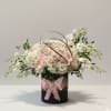 A delicate and dreamy arrangement created to celebrate the arrival of a